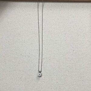 silver necklace with diamond charm